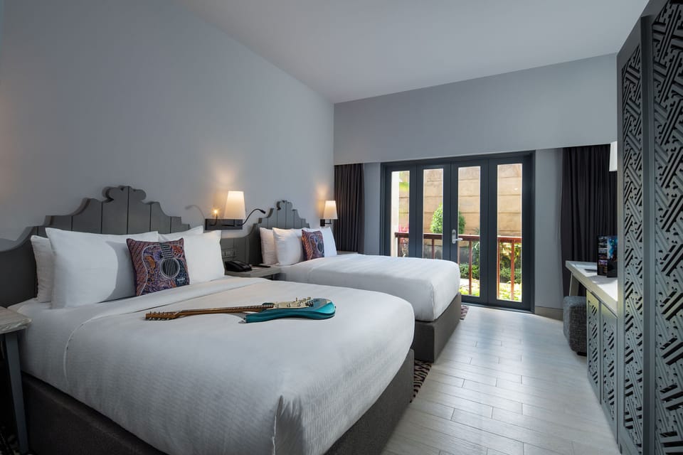 Deluxe Two Queens | 1 bedroom, minibar, in-room safe, desk