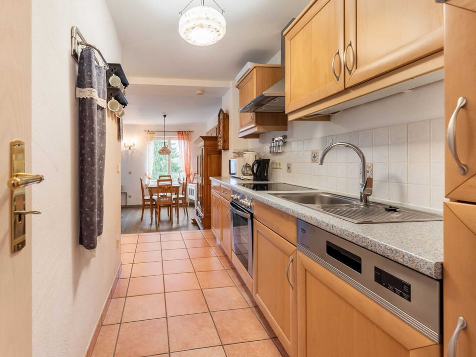 Apartment | Private kitchen | Fridge, highchair