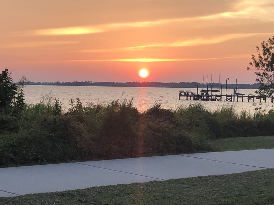 Sunset on Bay Drive a two-minute walk from the house or a bike ride. 