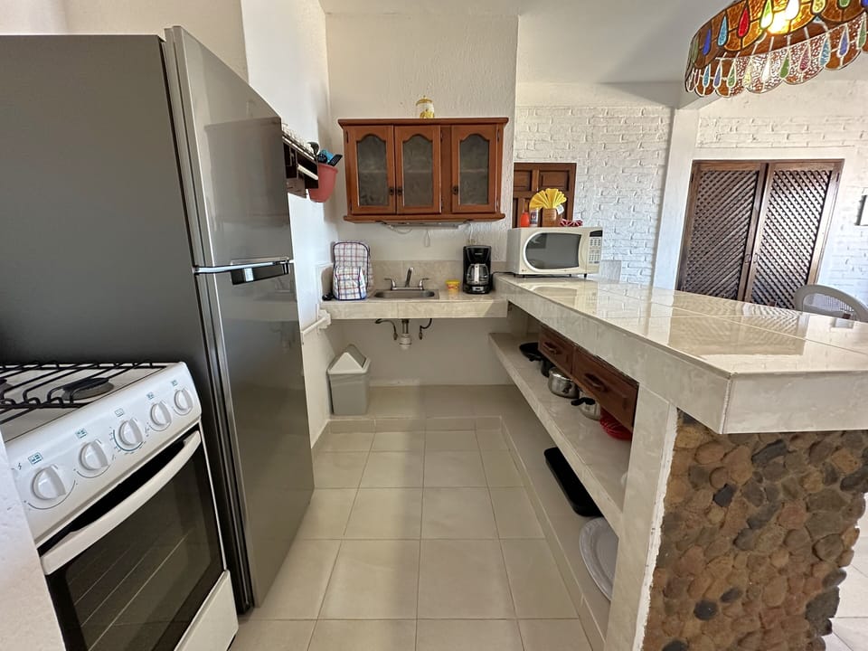 Junior Studio | Private kitchen | Full-size fridge, microwave, oven, stovetop