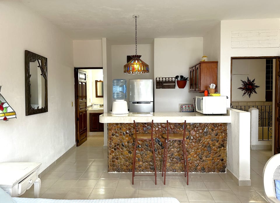 Junior Studio | Private kitchen | Full-size fridge, microwave, oven, stovetop