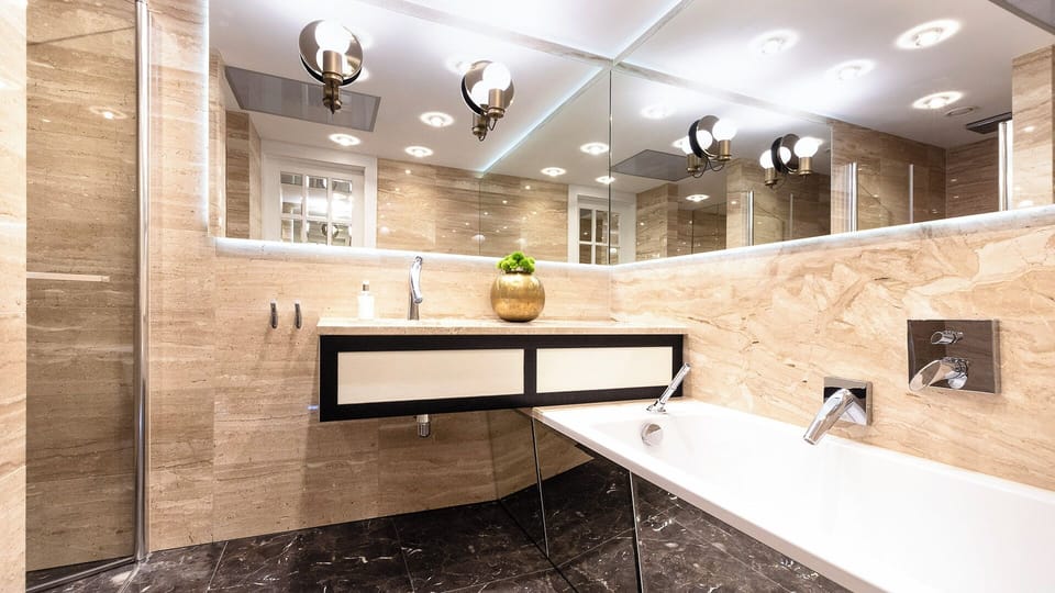 Grand Apartment, Kitchenette, Sea View | Bathroom | Shower, designer toiletries, hair dryer, bathrobes