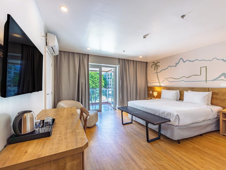 Deluxe Double Room, 1 Queen Bed, Balcony | Minibar, in-room safe, desk, blackout drapes