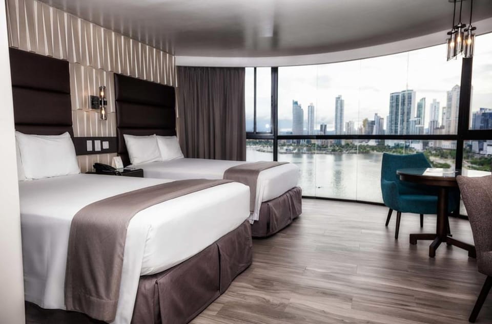 Premium bedding, down comforters, in-room safe, desk