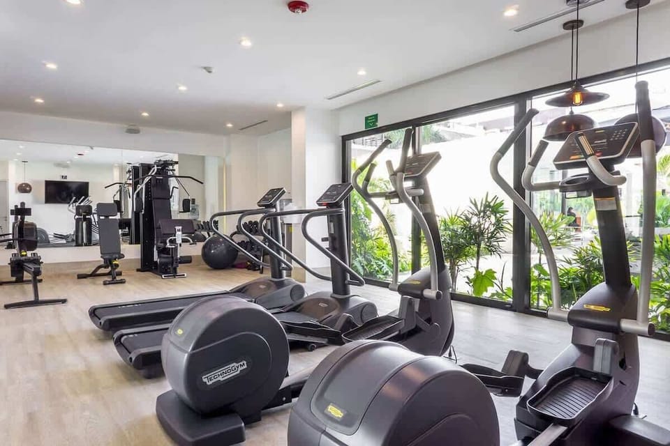 Área de ejercicio con equipo cardiovascular
