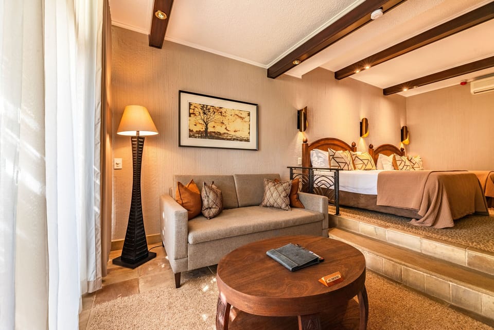 Family Room | Hypo-allergenic bedding available, minibar, in-room safe, desk