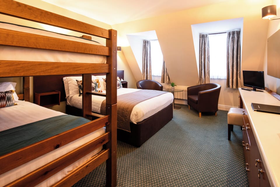 Family Room | Iron/ironing board (on request), travel crib, WiFi (free), bed sheets