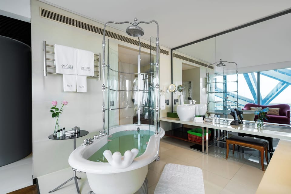 Grand Deluxe King with Terrace | Bathroom | Separate tub and shower, rainfall showerhead, designer toiletries
