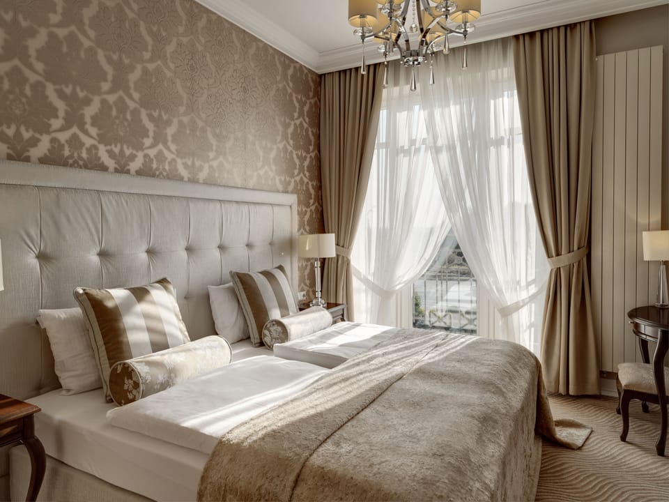 Premium bedding, down comforters, pillowtop beds, minibar