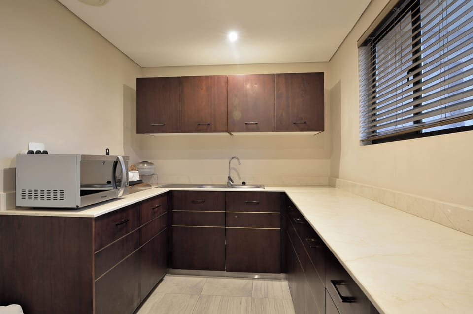 Presidential Suite | Private kitchen | Coffee/tea maker, electric kettle