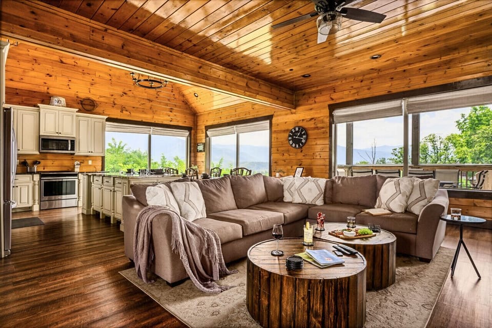 Living area with an indoor fireplace and comfortable seating for everyone!