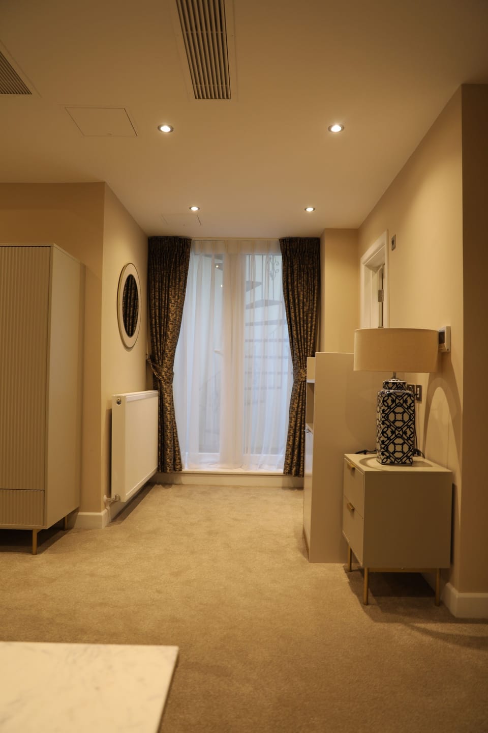 Executive Quadruple Room, 1 Bedroom | In-room safe, desk, laptop workspace, iron/ironing board