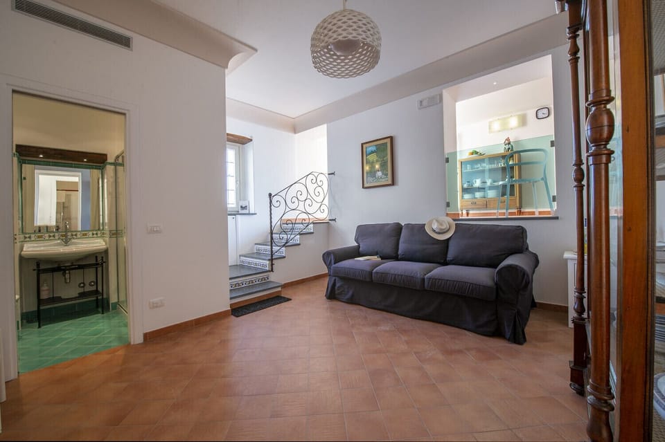 House, 1 Bedroom | Living area | Flat-screen TV