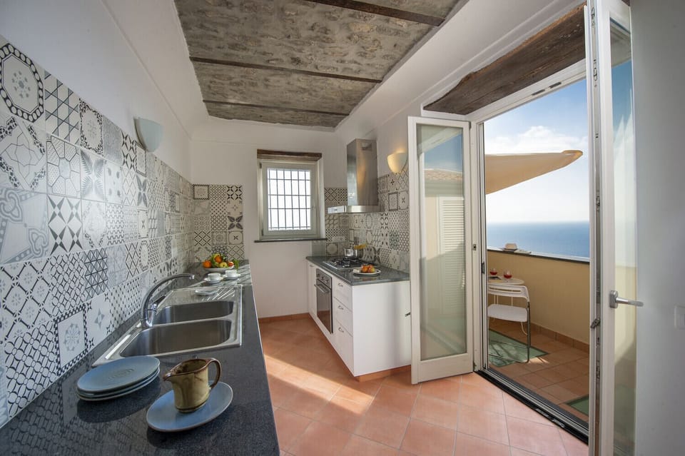 Apartment, 2 Bedrooms | Private kitchen | Fridge, microwave, oven, stovetop
