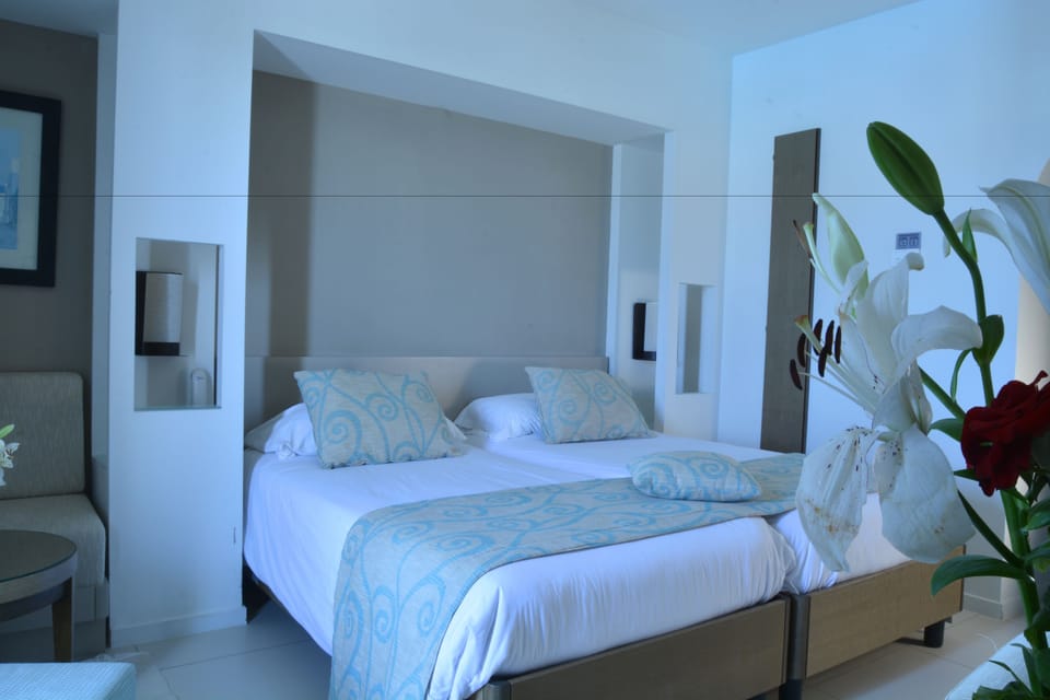 Minibar, in-room safe, blackout drapes, free WiFi