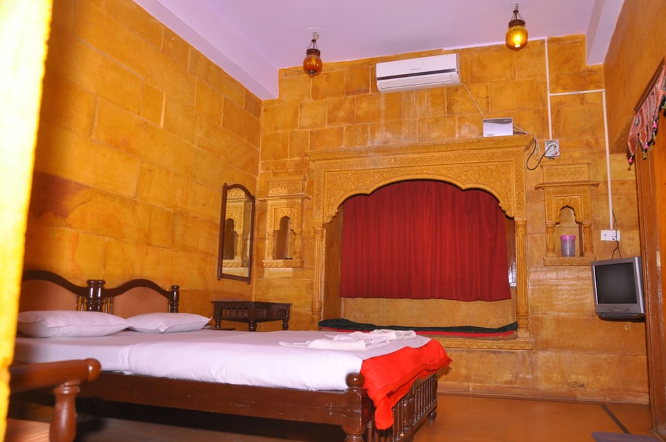Standard Room (A/C) | Premium bedding, memory foam beds, desk, free WiFi