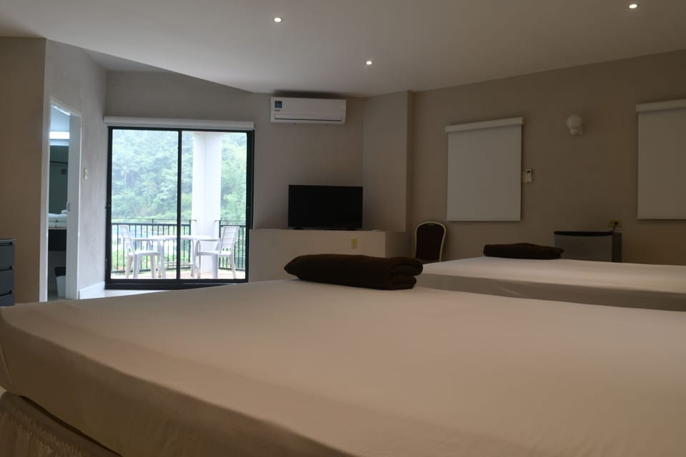 Superior Room, 2 Double Beds | Desk, blackout drapes, iron/ironing board, high-speed internet
