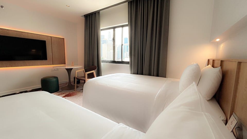 Merdeka Twin with View | Down comforters, pillowtop beds, minibar, in-room safe