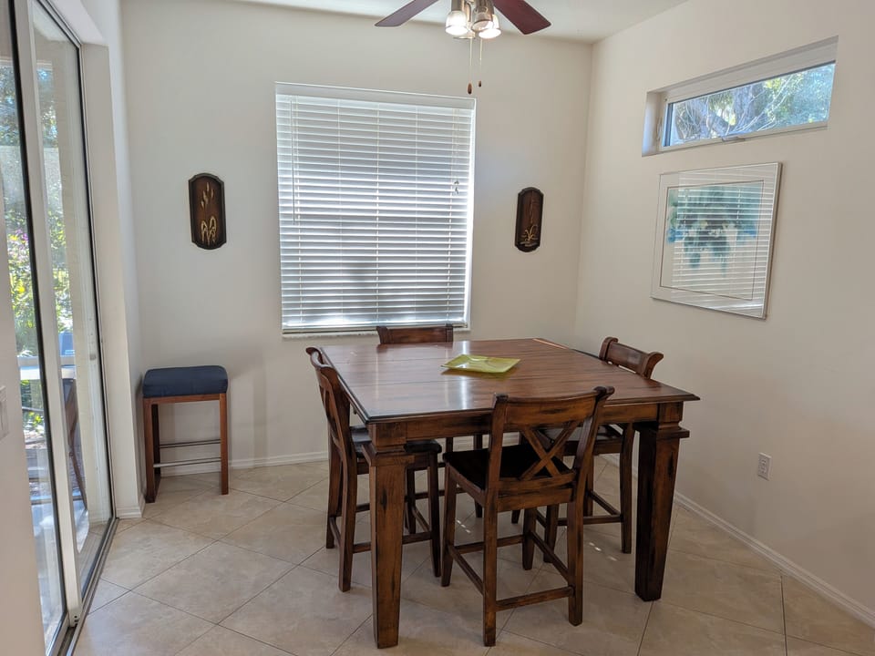 Dining area, separate bar area with 3 seats off kitchen