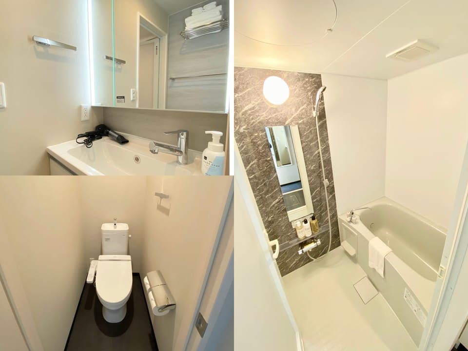 Combined shower/tub, free toiletries, hair dryer, slippers