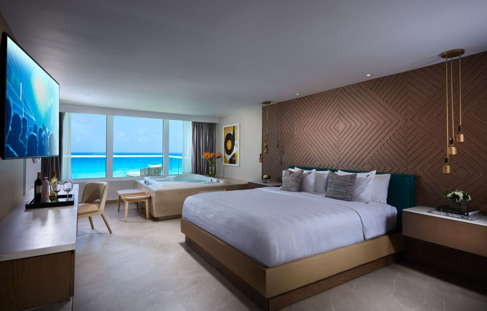 Premium bedding, down comforters, free minibar, in-room safe