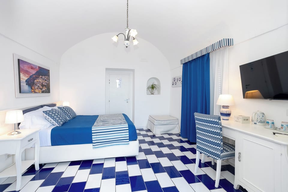 Economy Room with private external bathroom | Premium bedding, in-room safe, individually decorated