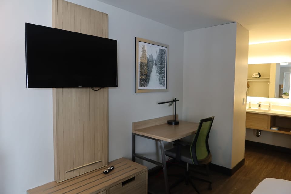 Desk, blackout drapes, iron/ironing board, WiFi (free)