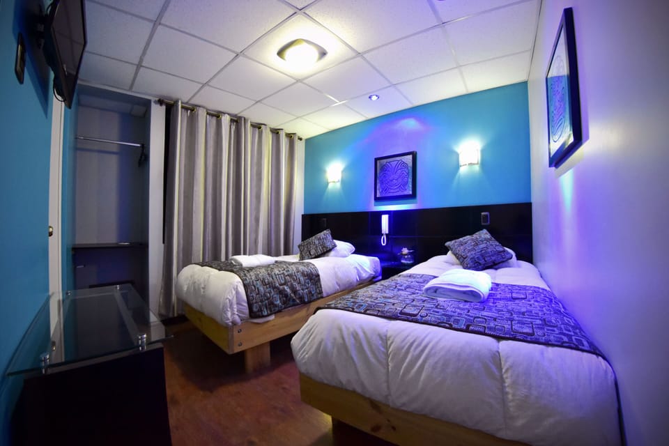 Double Room, 2 Twin Beds | In-room safe, individually decorated, desk, free WiFi