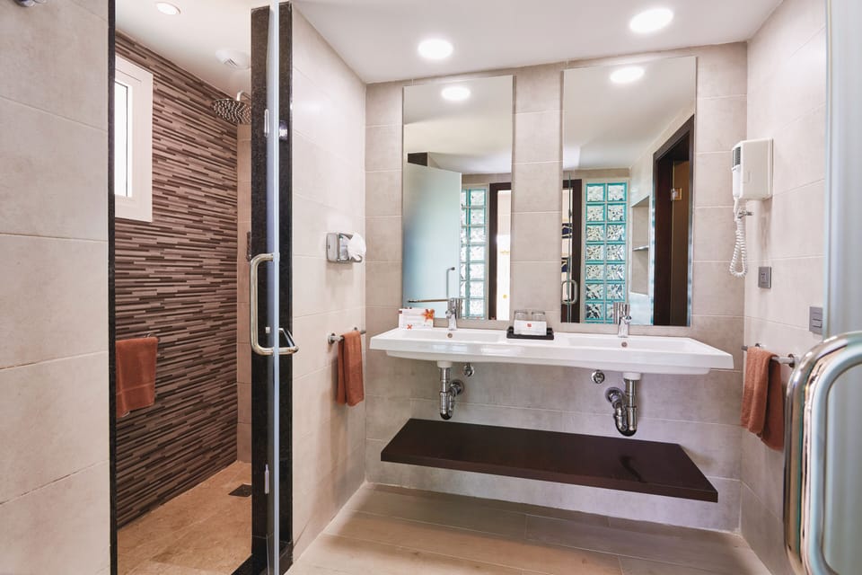 Shower, rainfall showerhead, eco-friendly toiletries, hair dryer