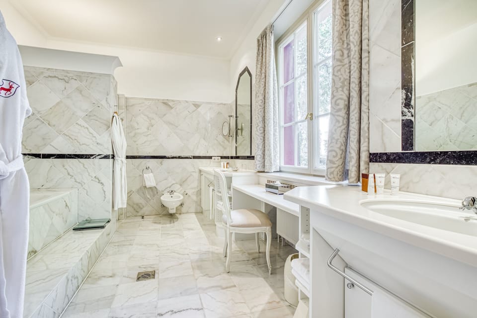 Deluxe Suite (Torhaus) | Bathroom | Separate tub and shower, designer toiletries, hair dryer, bathrobes