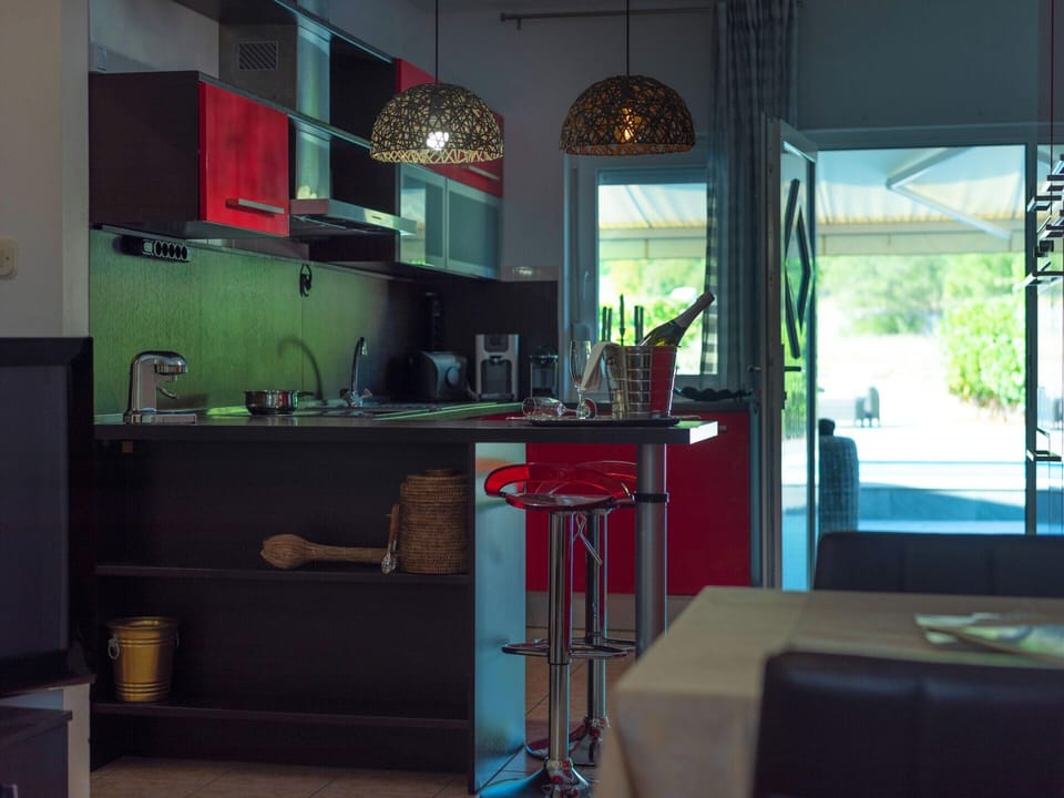 Villa | Private kitchen | Electric kettle, highchair