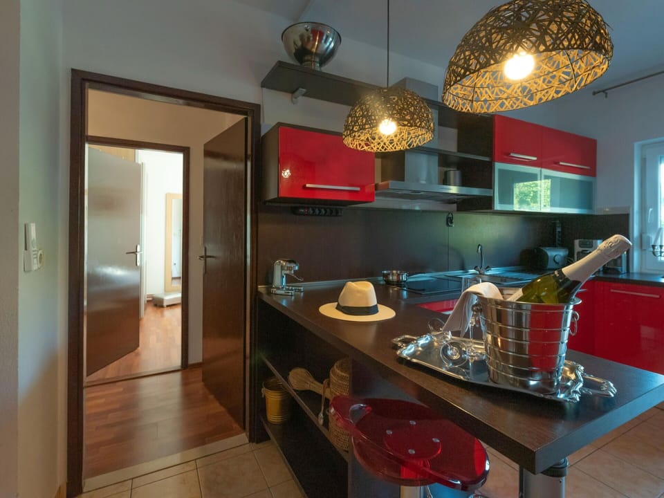 Villa | Private kitchen | Electric kettle, highchair