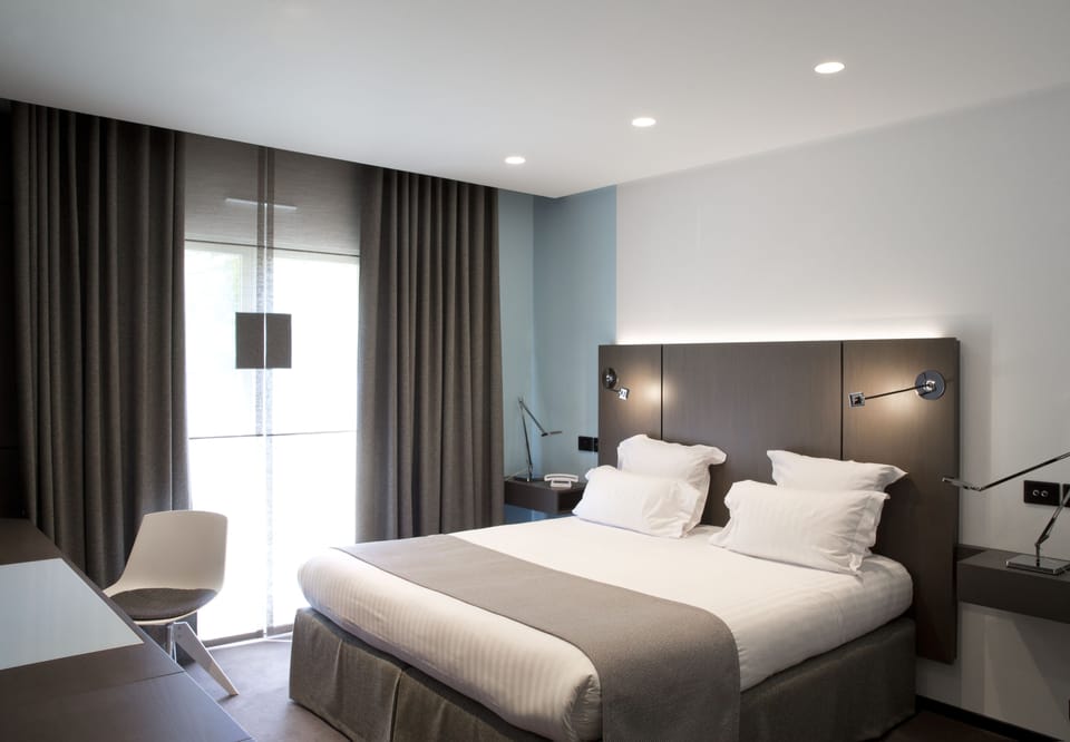 Deluxe Room | Premium bedding, minibar (free items), in-room safe, desk