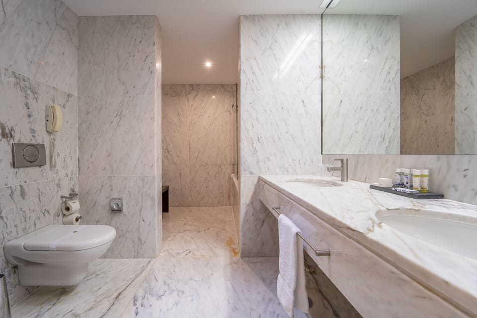 Combined shower/tub, free toiletries, hair dryer, bathrobes