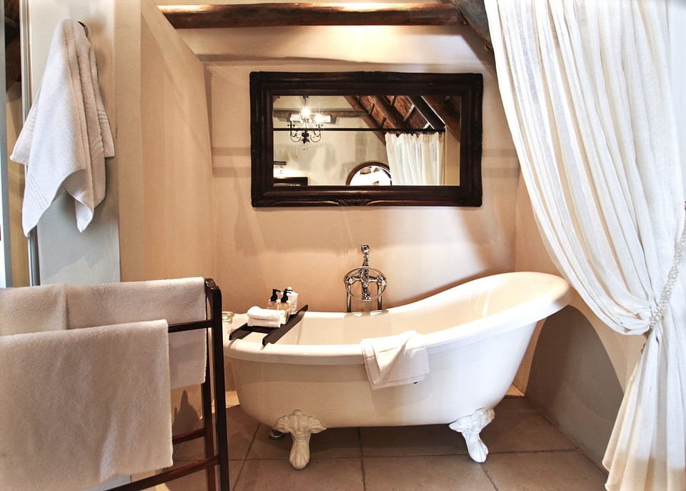 Separate tub and shower, deep soaking tub, designer toiletries