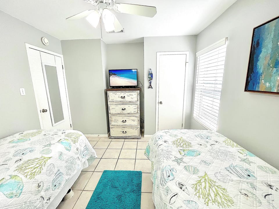 Comfortable guest bedroom with plenty of space for family and friends.