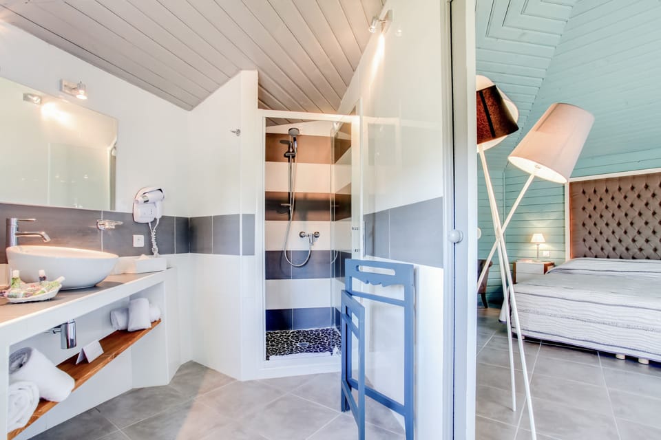 Shower, free toiletries, hair dryer, bathrobes