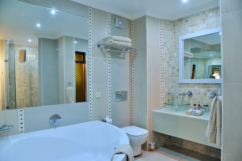 Suite, 1 King Bed, Garden View (Presidential Suite) | Bathroom | Separate tub and shower, eco-friendly toiletries, hair dryer, bathrobes