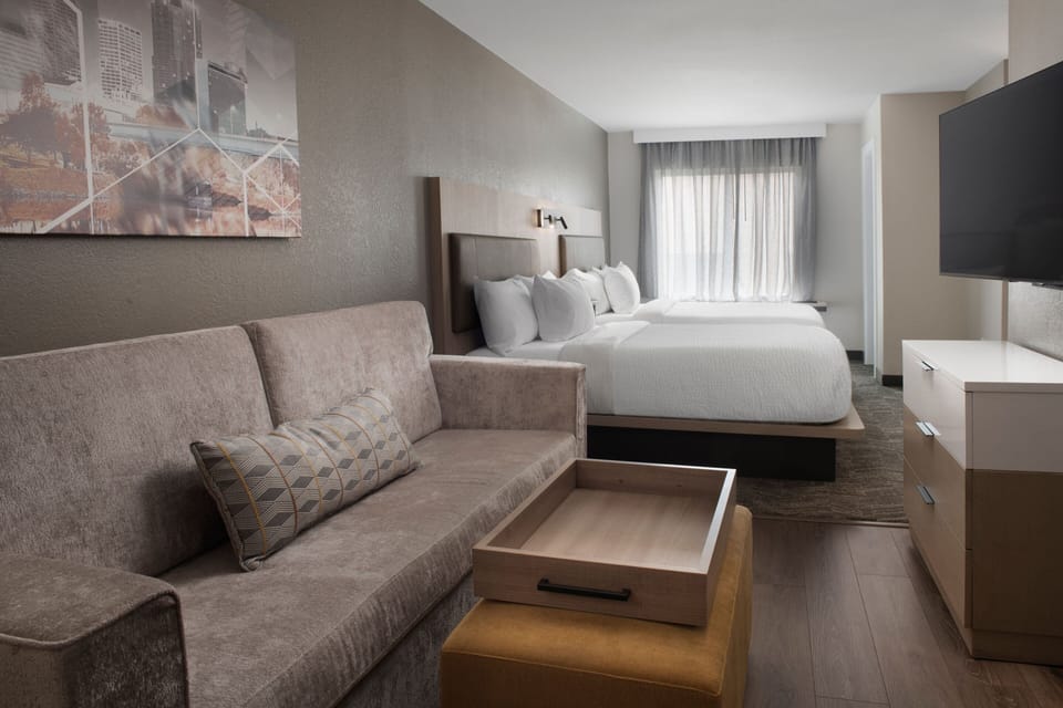Hypo-allergenic bedding, in-room safe, desk, laptop workspace