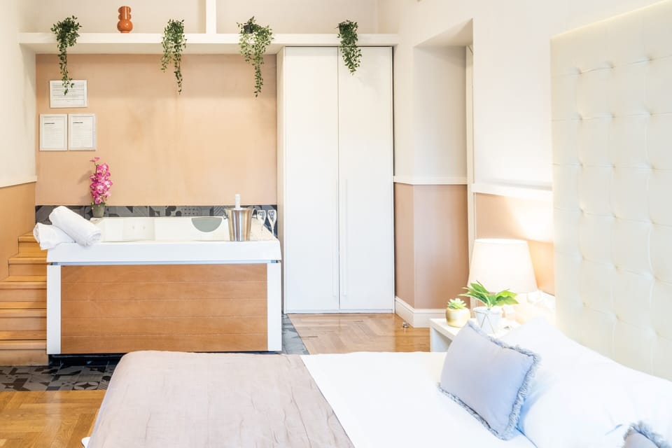 Suite, Jetted Tub (Breakfast at Navona Street Hotel) | Minibar, in-room safe, desk, laptop workspace