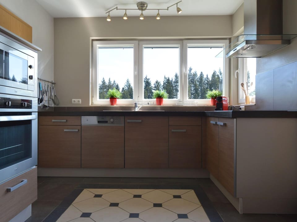 Apartment | Private kitchen | Stovetop, highchair