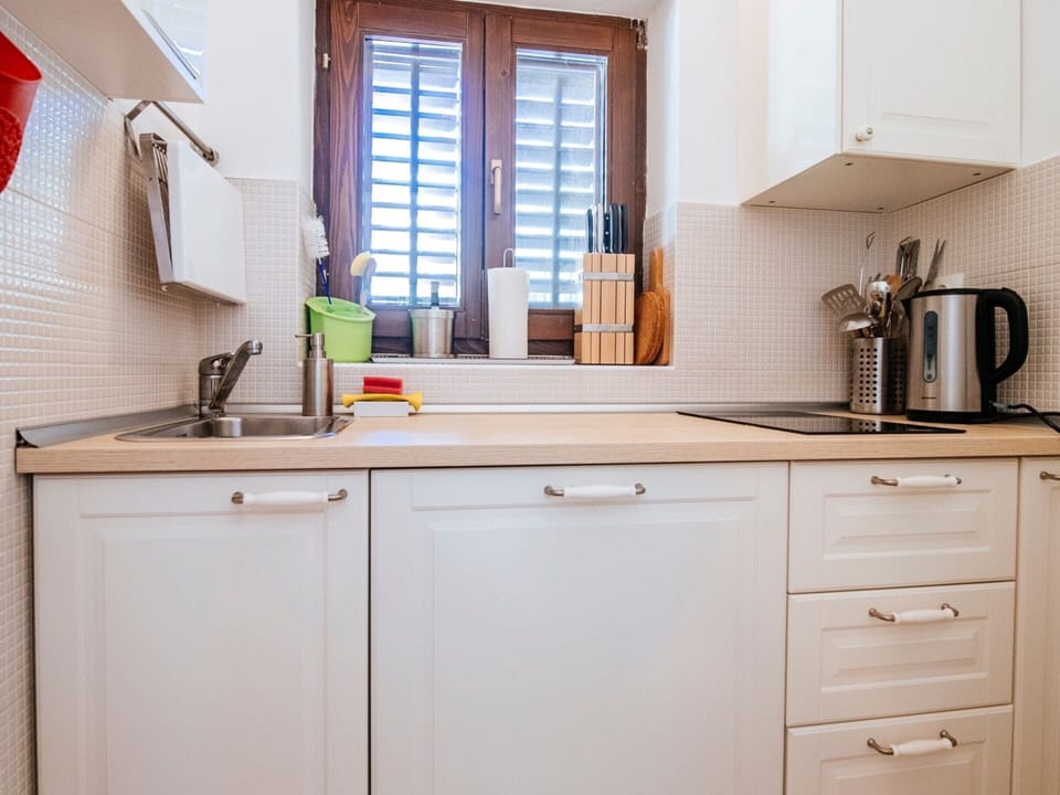 House | Private kitchen | Fridge, highchair, cookware/dishes/utensils