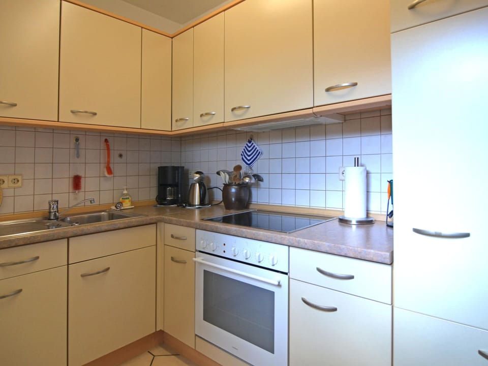 Apartment | Private kitchen | Stovetop, highchair