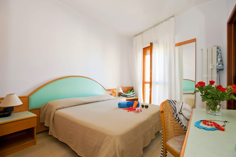 Economy Quadruple Room | Premium bedding, down comforters, desk, laptop workspace