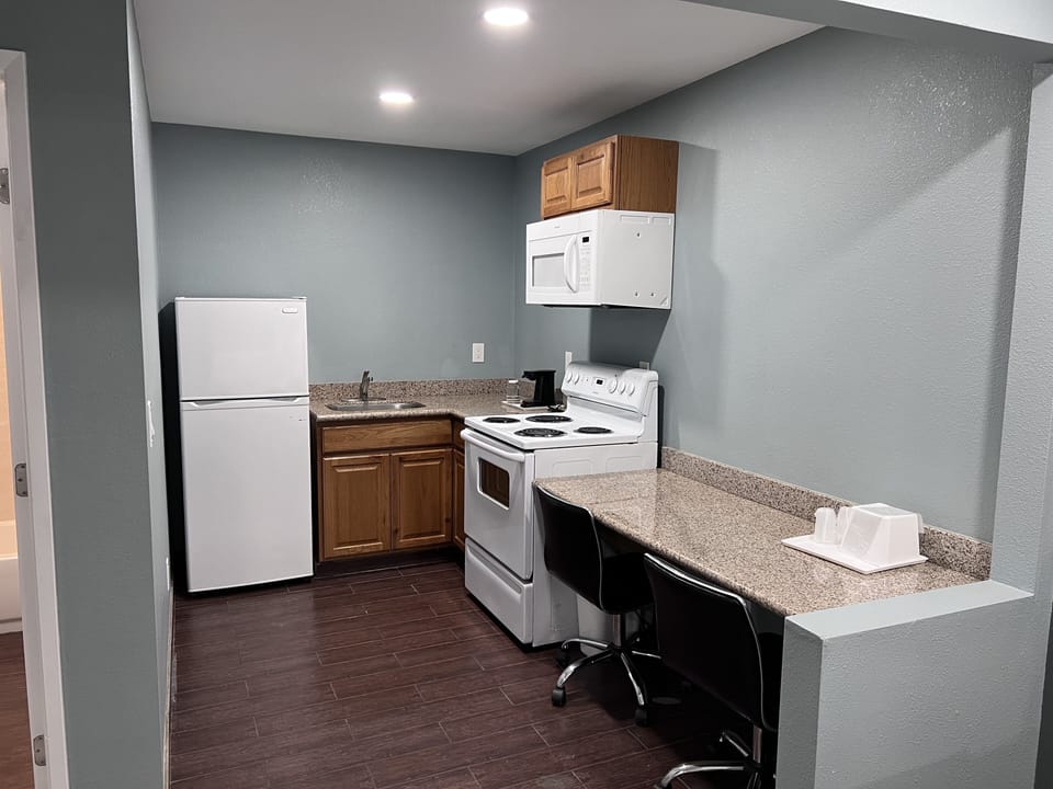 Premium Studio, 2 Queen Beds, Kitchen | Private kitchen | Fridge, microwave