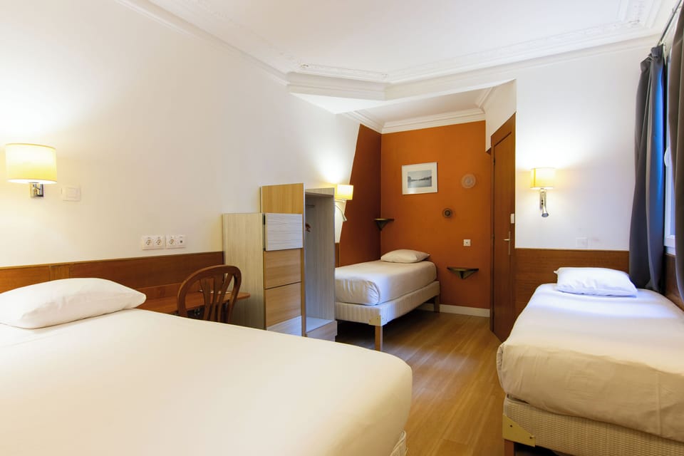 Quadruple Room, Shared Bathroom | Select Comfort beds, desk, WiFi (free), bed sheets
