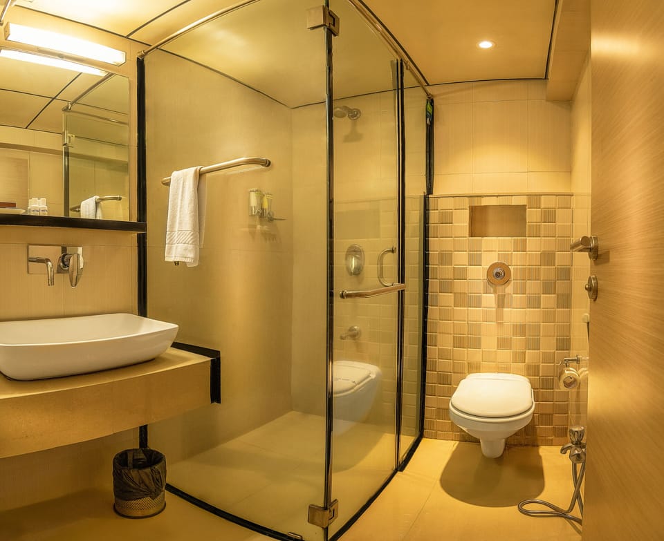 Classic Room | Bathroom | Shower, rainfall showerhead, designer toiletries, hair dryer