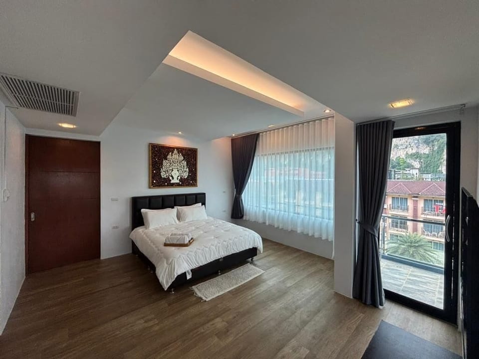 Phranang Place Family Suite | Hypo-allergenic bedding, in-room safe, desk, free WiFi