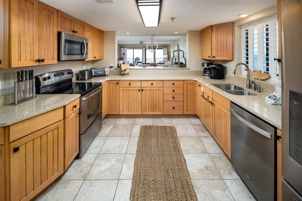 Kitchen - Spacious modern Kitchen with Spectacular Views and High-end Appliances...all the comforts of home of home and MORE!!