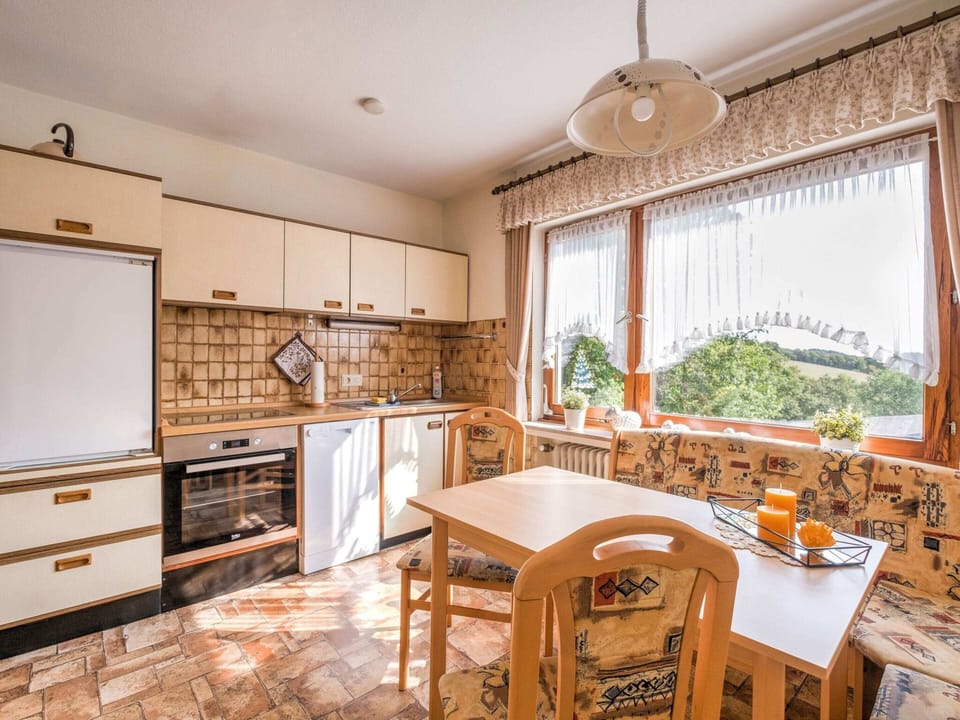 Apartment | Private kitchen | Fridge, highchair